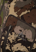 Pnuma Outdoors Gunnison Merino Wool Hoodie featuring convenient zippered chest and hand pockets for secure storage of calls, tags, or small gear in the field. Built with soft, breathable merino wool for natural odor control and thermal regulation, this hunting hoodie delivers quiet performance and functional storage for layering or standalone wear during early to mid-season hunts