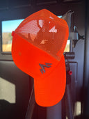 Orange Pnuma Outdoors cap with a mesh back and logo, designed for outdoor activities.